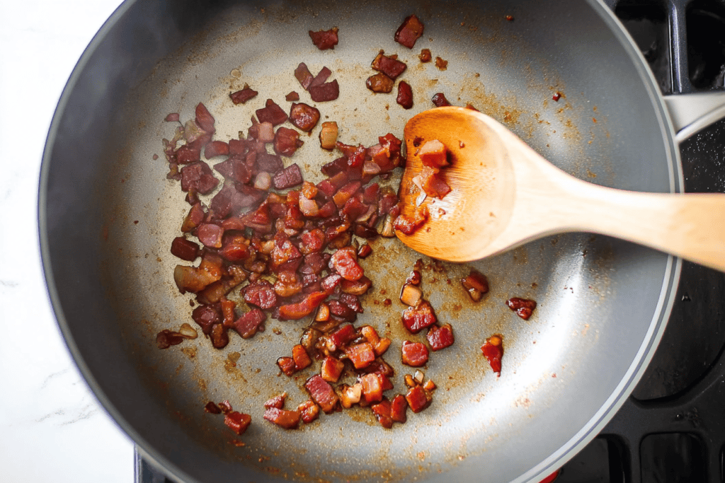 ook the pancetta or bacon and garlic